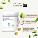 A white tub of K+Hydration K+ Lime electrolyte powder shown on a light cream background with ingredient callouts and floating lime graphics. Text highlights organic freeze-dried lime fruit powder, Diamond Crystal kosher salt, and potassium citrate & magnesium malate.