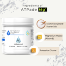 A white tub of ATPade Mg+ Unflavored magnesium hydration powder shown on a light cream background with ingredient callouts: Diamond Crystal Kosher Salt, Magnesium Malate (Albion), and Potassium Citrate.